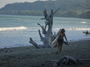 Women surfing in Matapalo, Costa Rica.