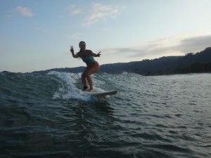 Women surfing in Matapalo, Costa Rica.