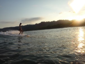 Women surfing in Matapalo, Costa Rica.