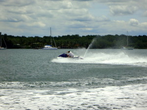 Red on the jet ski.