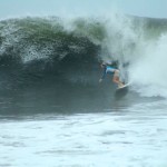 Aloe Driscoll surfing in El Salvador.