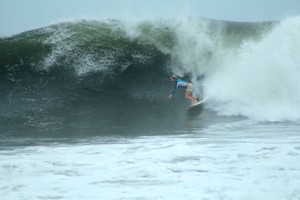 Aloe Driscoll surfing in El Salvador.