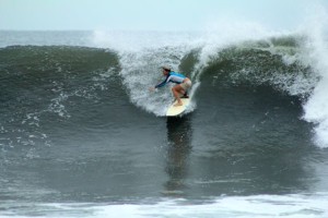 Aloe Driscoll surfing in El Salvador.