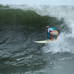 Aloe Driscoll surfing in El Salvador.
