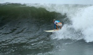 Aloe Driscoll surfing in El Salvador.