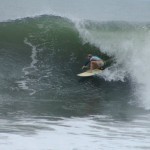 Aloe Driscoll surfing in El Salvador.