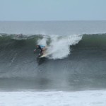 Aloe Driscoll surfing in El Salvador.