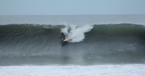 Aloe Driscoll surfing in El Salvador.