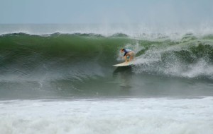 Aloe Driscoll surfing in El Salvador.