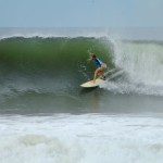 Aloe Driscoll surfing in El Salvador.