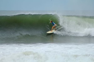 Aloe Driscoll surfing in El Salvador.