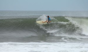 Aloe Driscoll surfing in El Salvador.