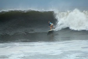 Aloe Driscoll surfing in El Salvador.
