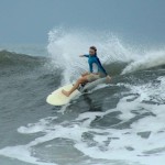 Aloe Driscoll surfing in El Salvador.