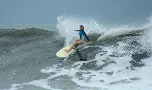 Aloe Driscoll surfing in El Salvador.