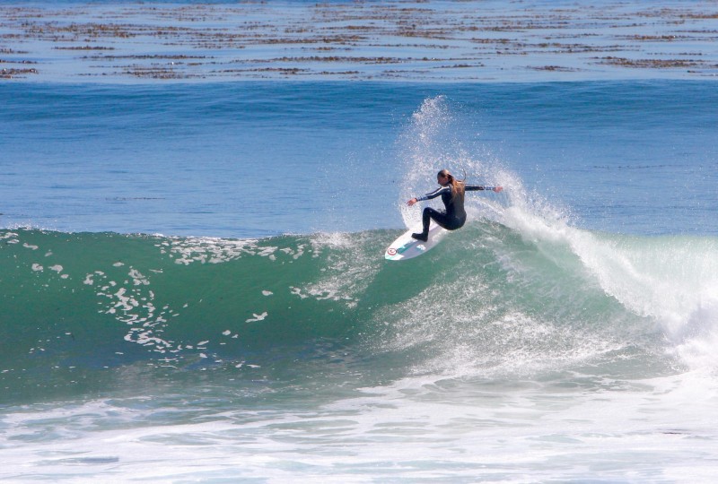 Emma Stone surfing in Santa Cruz