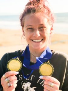 Emma Stone surfing champion.
