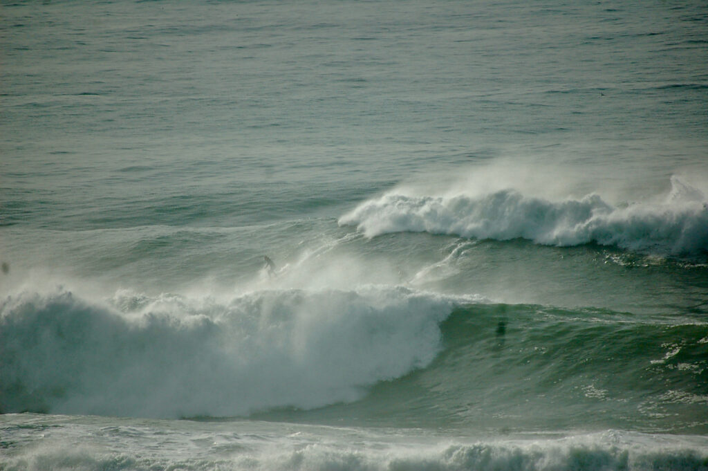 Aloe Driscoll surfing Mavericks.